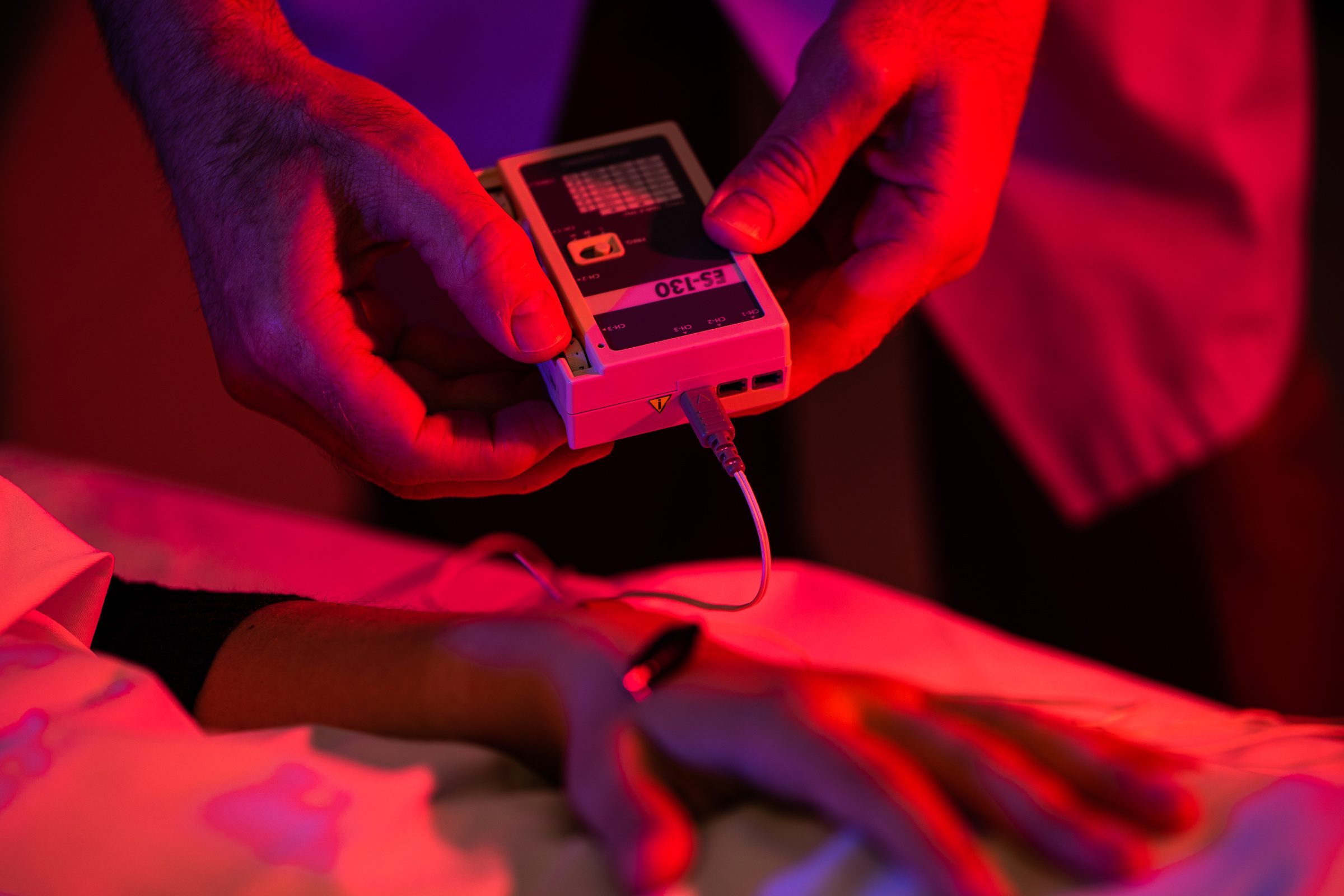 Dr. Aaron Michelfelder uses acupuncture to help treat peripheral neuropathy, a condition that results from damage to the nerves, which causes certain extremities to experience intense hot and cold pain before eventually losing all feeling. (Photo by: Lukas Keapproth)