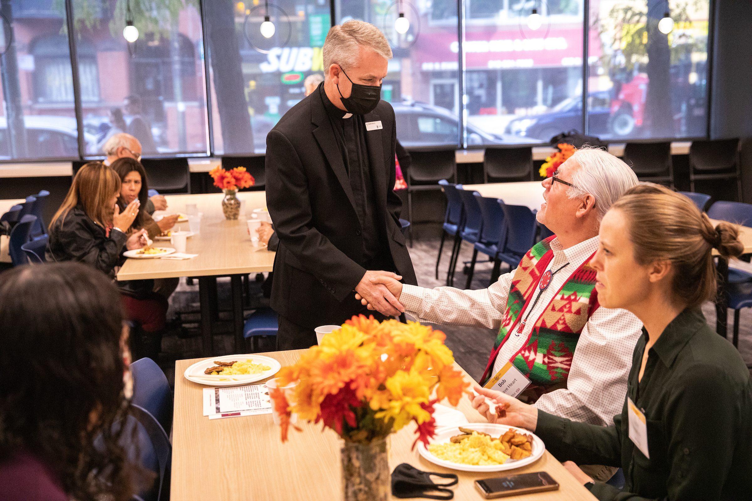 Loyola University Chicago ambassadors take Opus Prize finalists on a tour of the Water Tower Campus on November 10, 2021. (Photo: Lukas Keapproth)