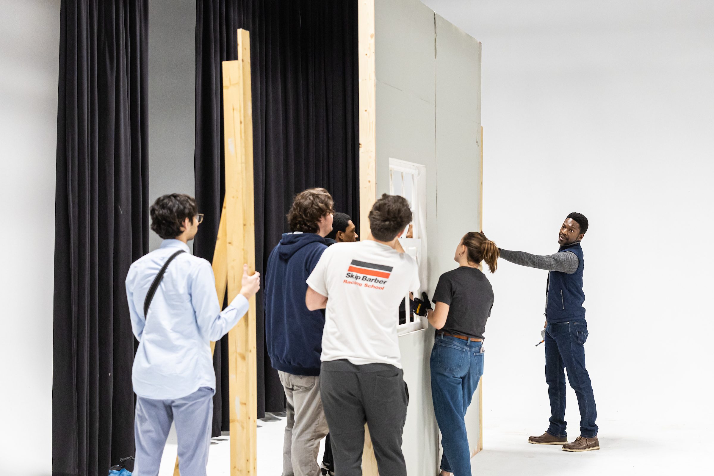 Professor Vincent Singleton teaches School of Communications students in his cinematography class held at Resolution Studios on the near west side of Chicago. As part of the assignment, Singleton's students work to recreate a scene from a chosen film to learn more about lighting and camera work. (Photo: Lukas Keapproth)