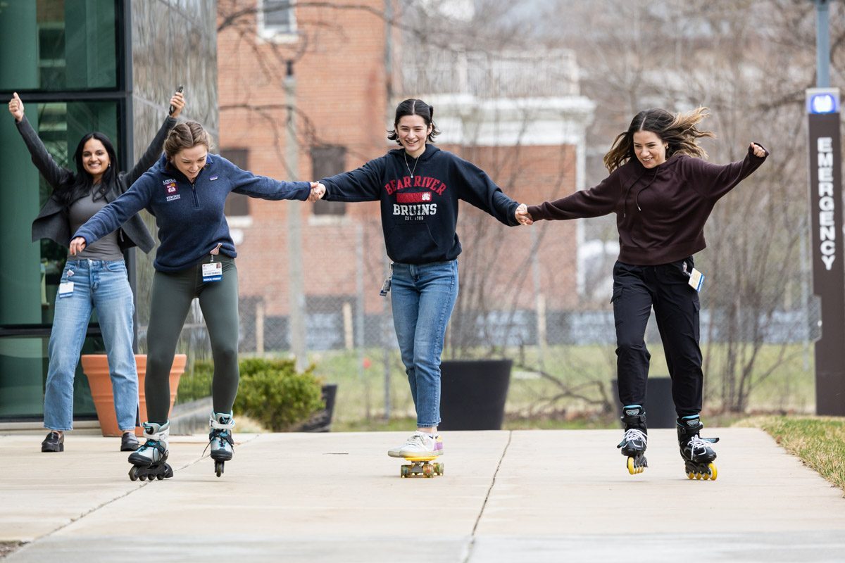 Loyola Stritch School of Medicine students blow off some steam after exams at the Health Sciences Campus on March 25, 2024. (Photo: Lukas Keapproth)
